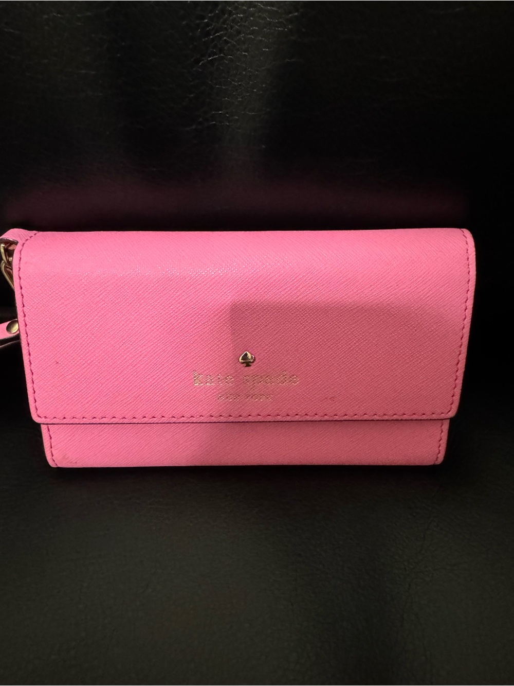 kate spade pink saffiano leather flap wallet with gold logo
